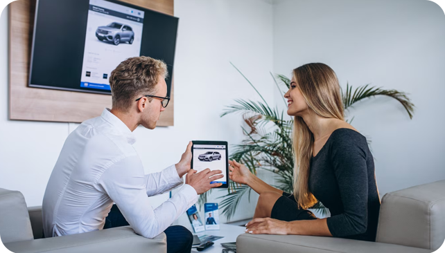 salesman and client for an instant car loan in BC