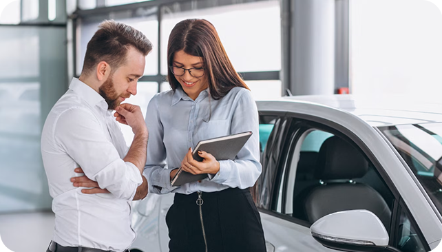 sales person explaining bad credit car loans to a client